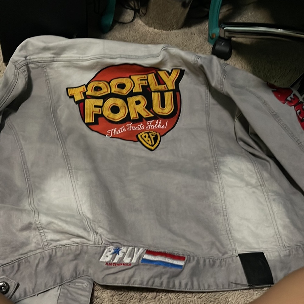 A patch jacket. - Picture 2 of 2